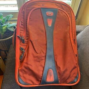 Tumi Red and Black Travel Bag